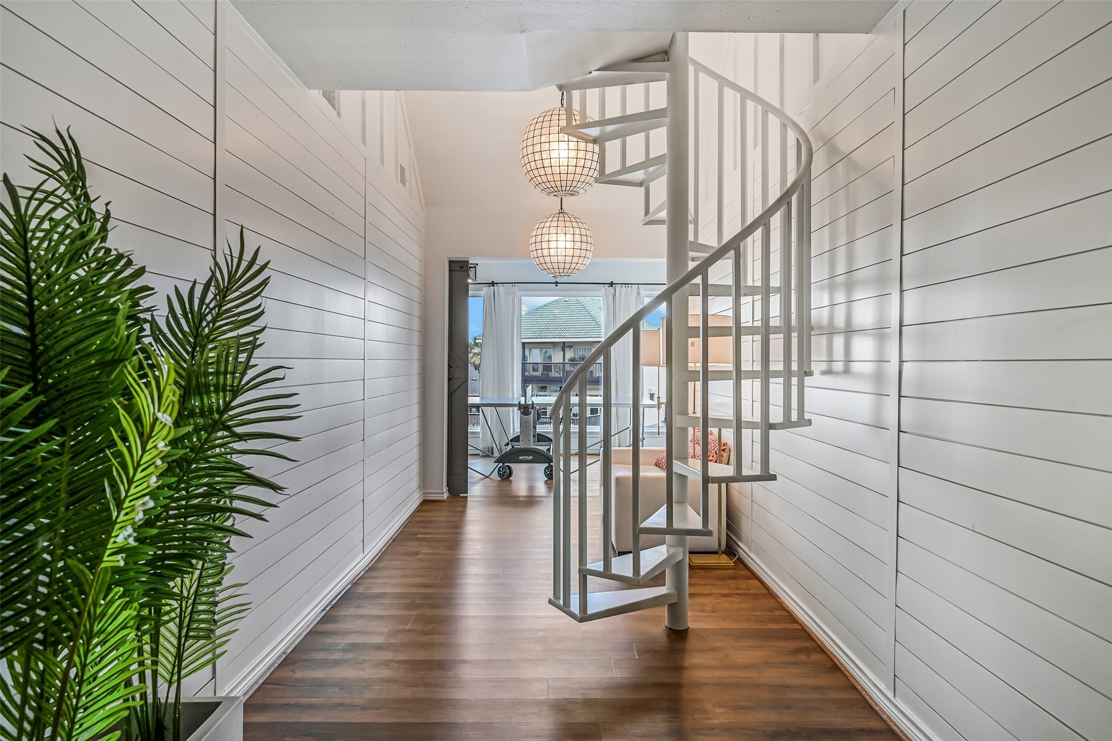 Two staircases help a home of this scale flow naturally between levels. Everyone can move easily between private retreats and shared gathering spaces.
