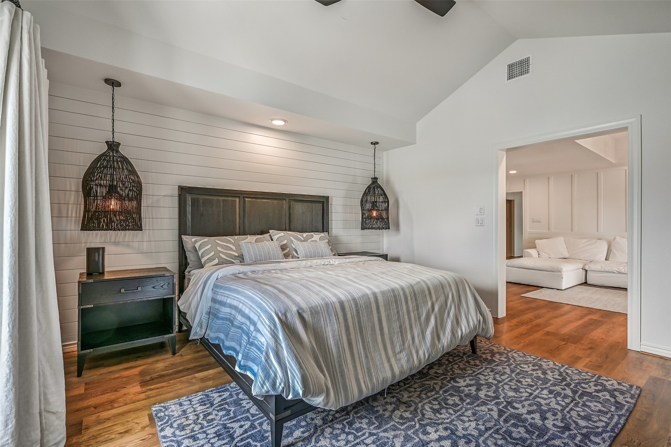 A peaceful retreat after a full day on the water. Generous proportions and access to outdoor space give the primary bedroom a welcome sense of privacy.