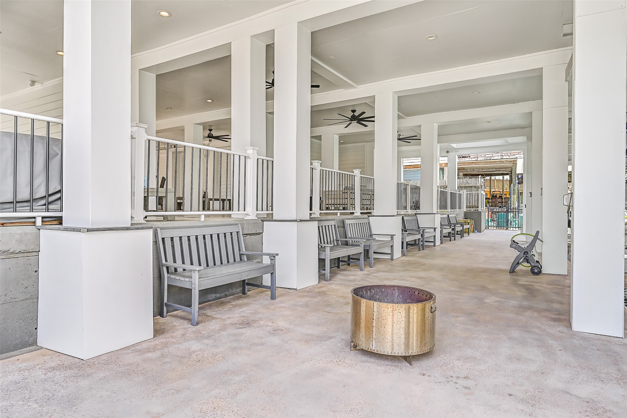 Bare feet and swimsuits welcome. Covered outdoor living connects the pool, dock and canal, making it easy for an entire Tiki day to unfold outside.