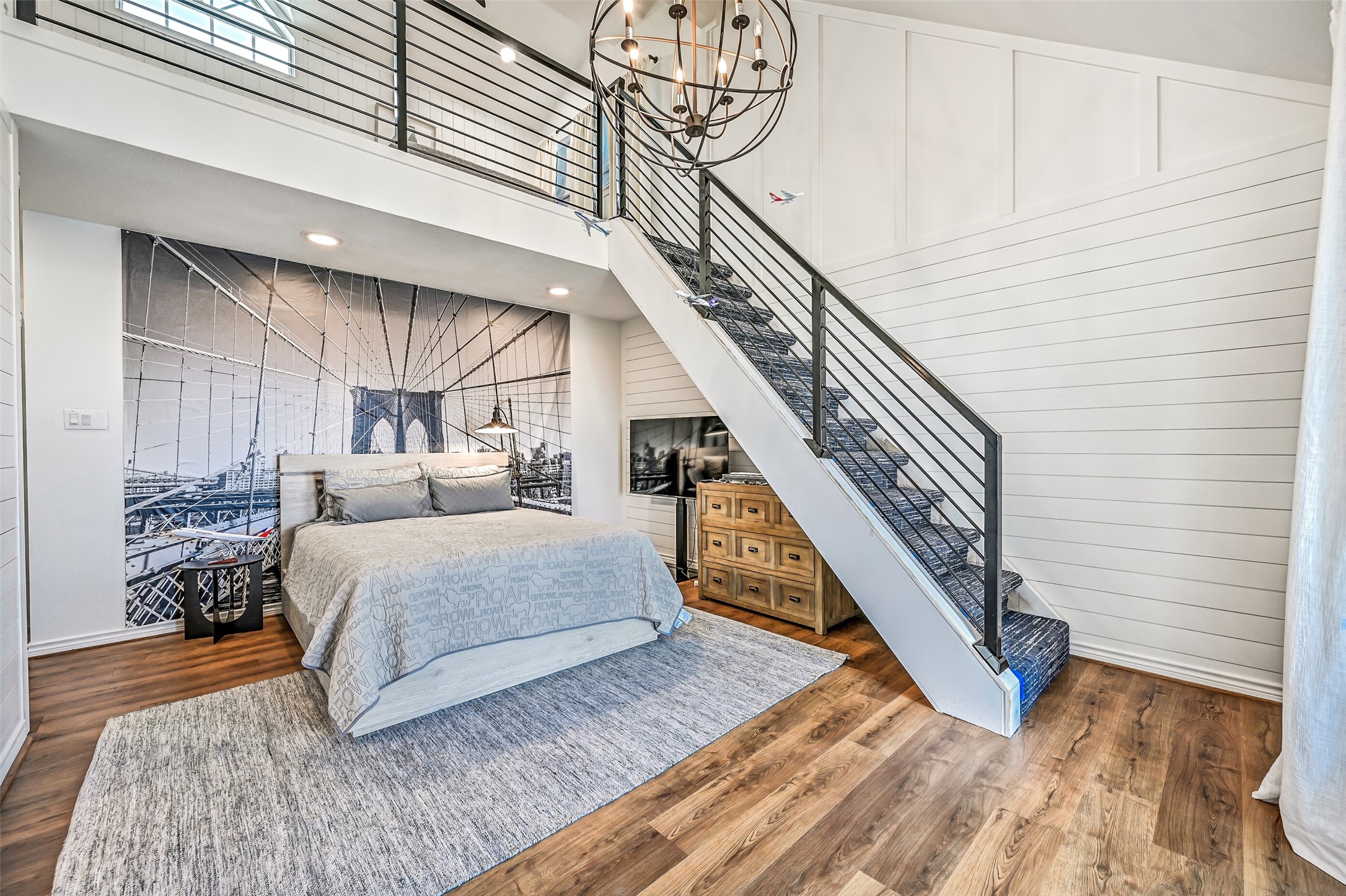 Every guest can find a space that feels like their own. Distinctive details give this bedroom personality while adding another comfortable retreat within the home.