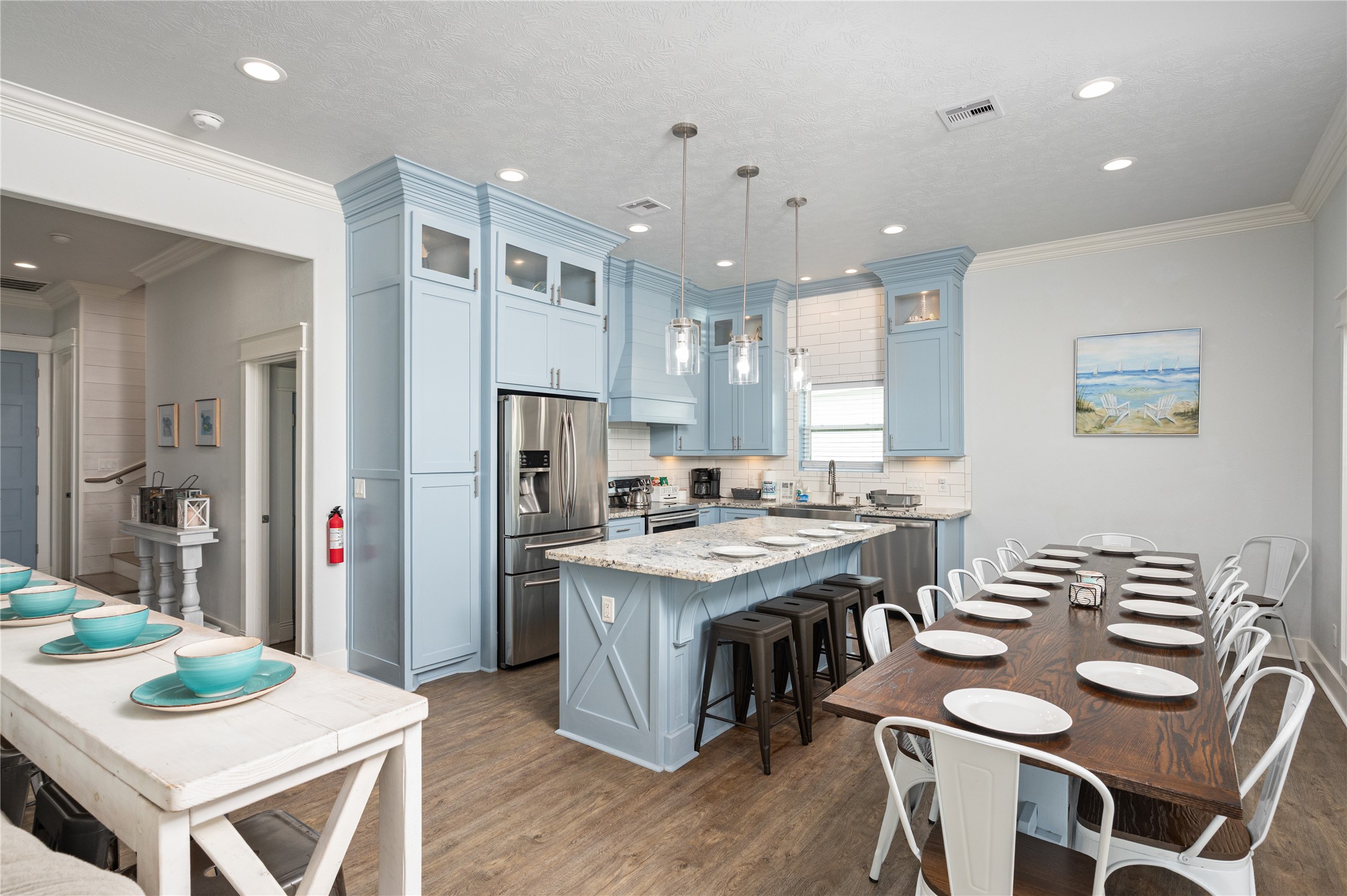 Hosting comes naturally in your spacious kitchen and dining area, with a large island, abundant cabinetry, and plenty of seating for everyone to gather.