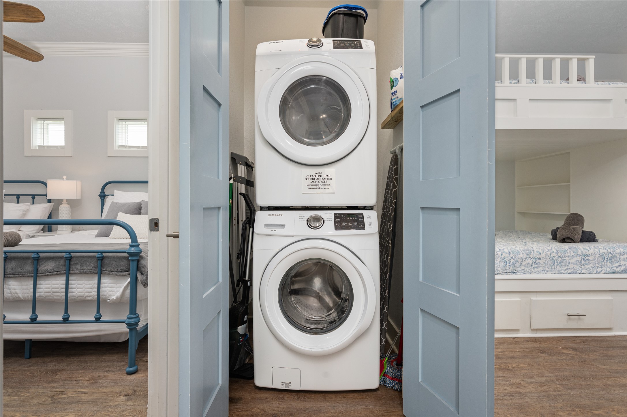 Laundry stays tucked neatly between the bedrooms with a space-saving stacked washer and dryer right where you need them.