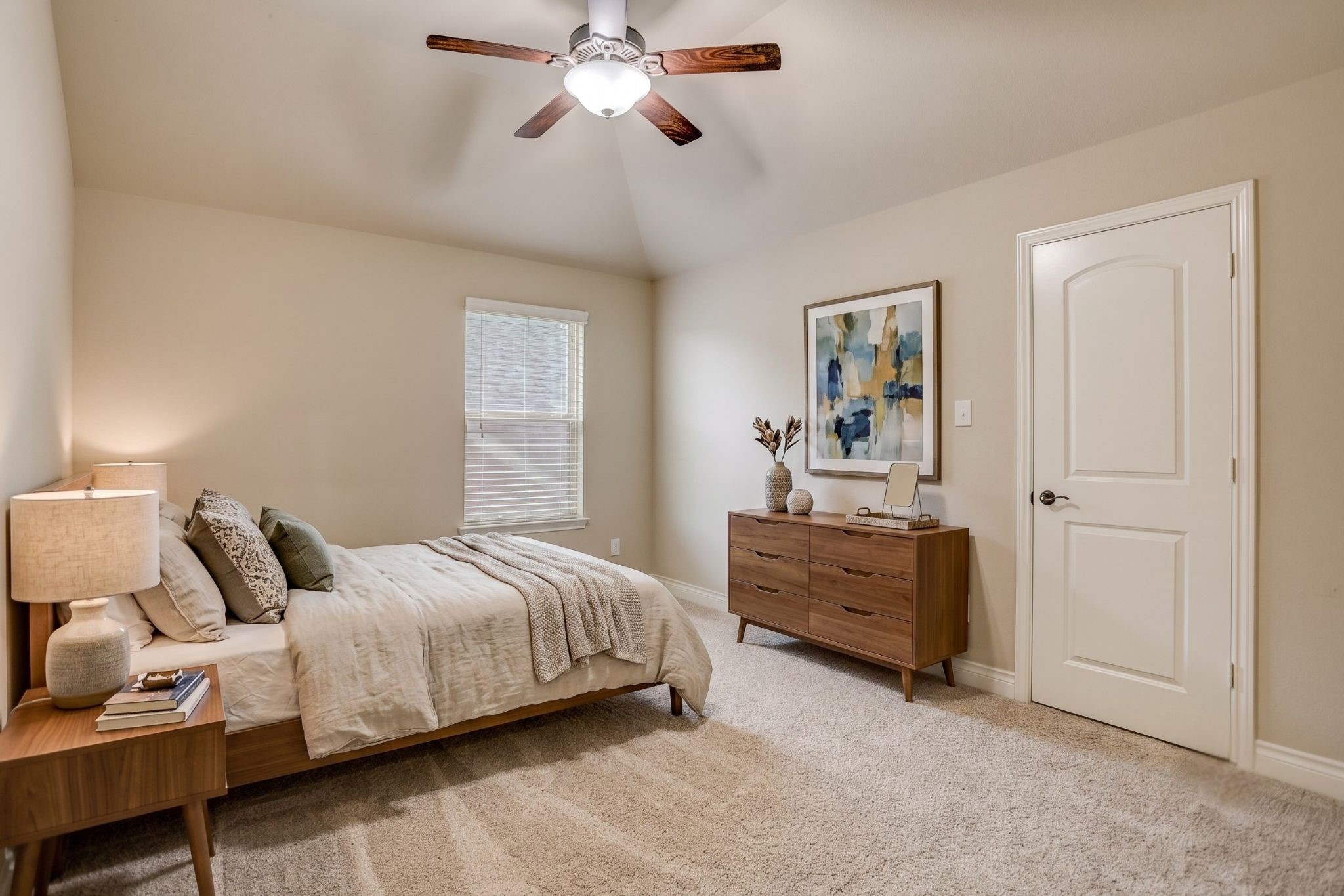 This spacious secondary bedroom has been *virtually staged* to showcase its versatility and inviting layout. Filled with natural light and offering ample closet space, it is connected to a convenient Jack-and-Jill bathroom