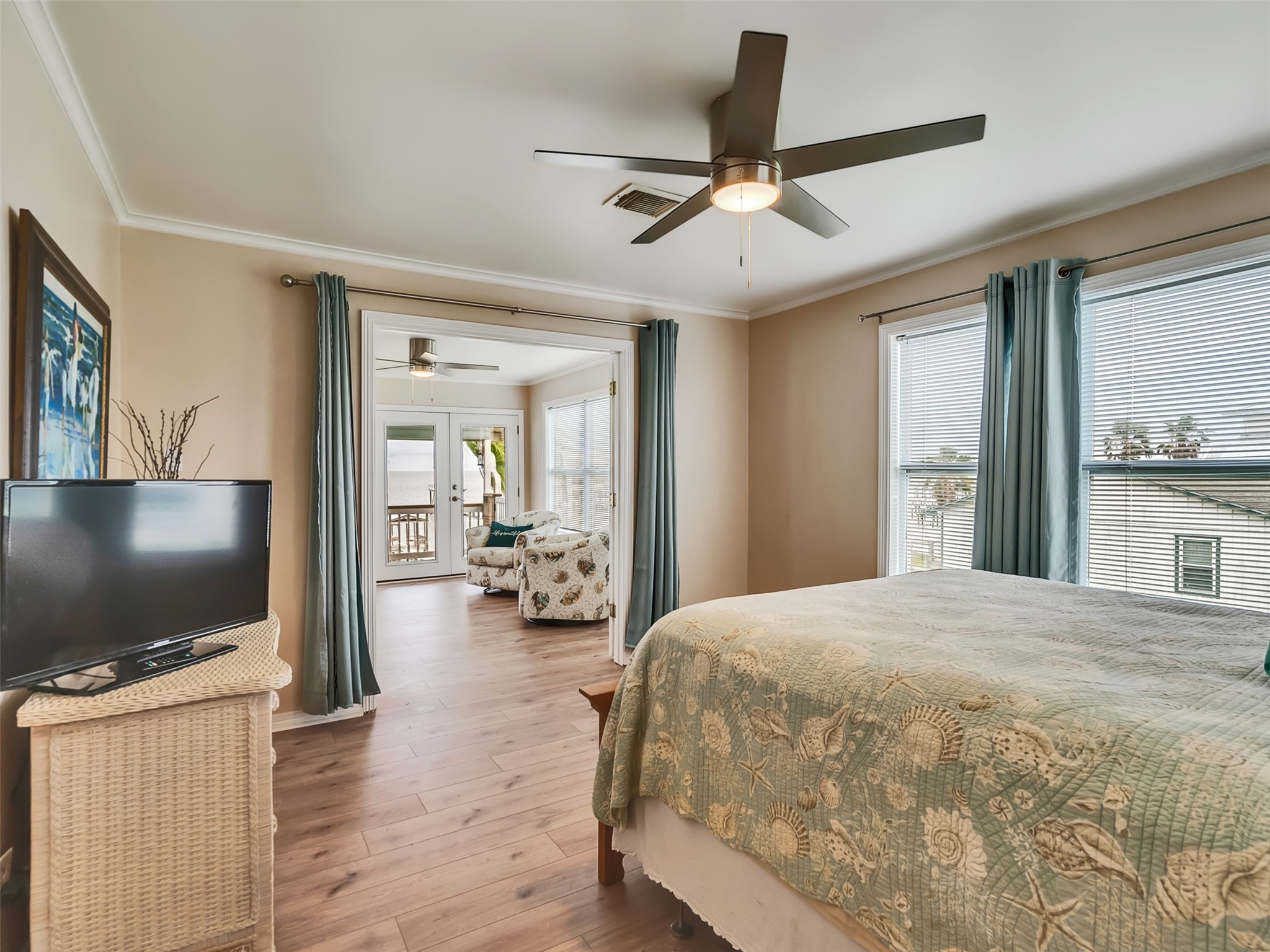 This primary bedroom is spacious and cozy.