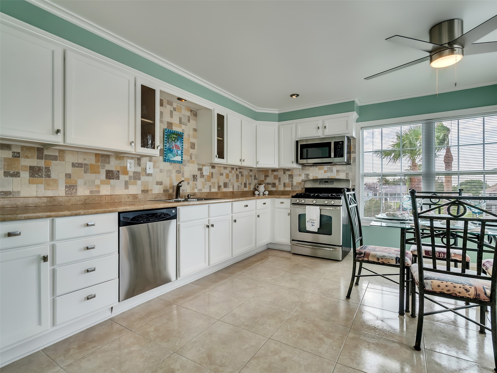 Sleek stainless appliances add a nice touch.