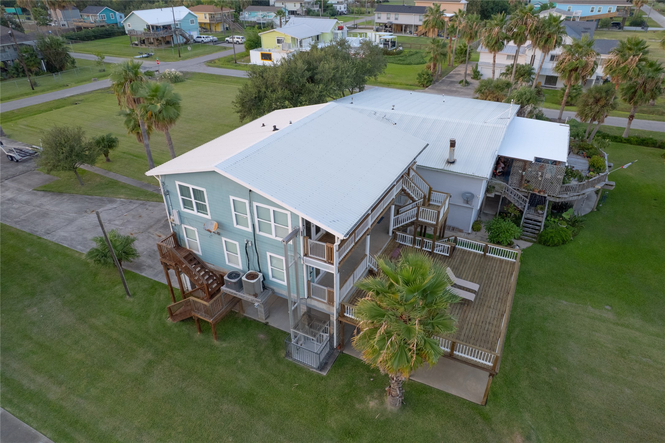 This home features a durable metal roof designed to withstand the elements while providing long-lasting protection. Its sleek, modern finish resists wind, rain, and sun damage, ensuring minimal maintenance and enhanced energy efficiency.