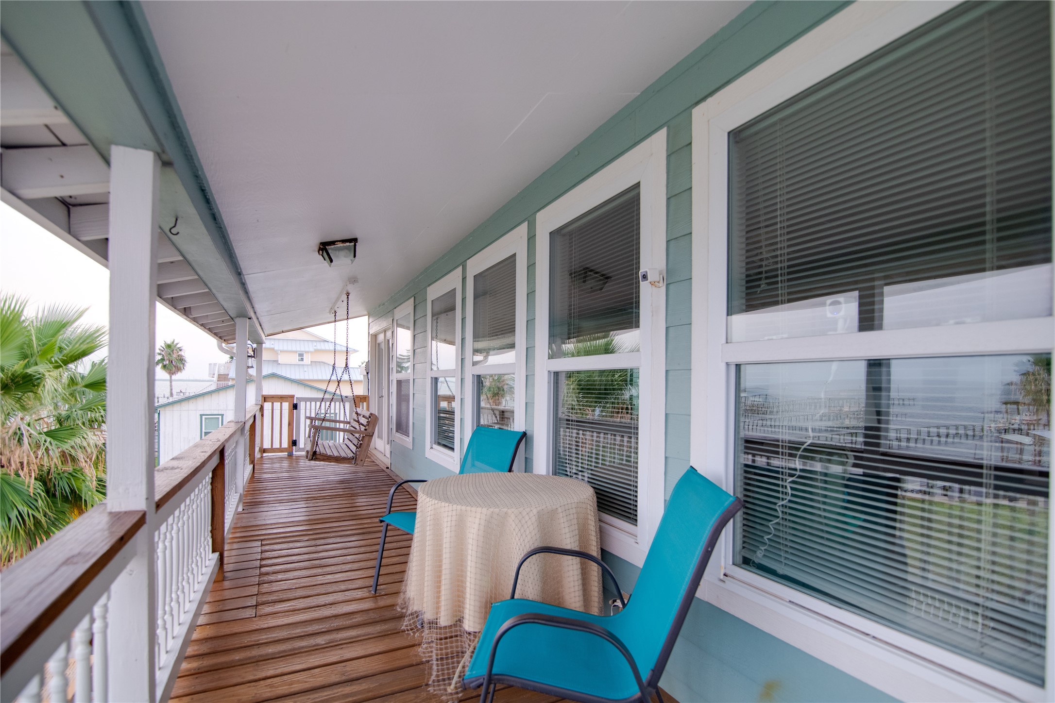 This balcony offers breathtaking views of the bay, providing a perfect spot to relax and take in the tranquil waters.