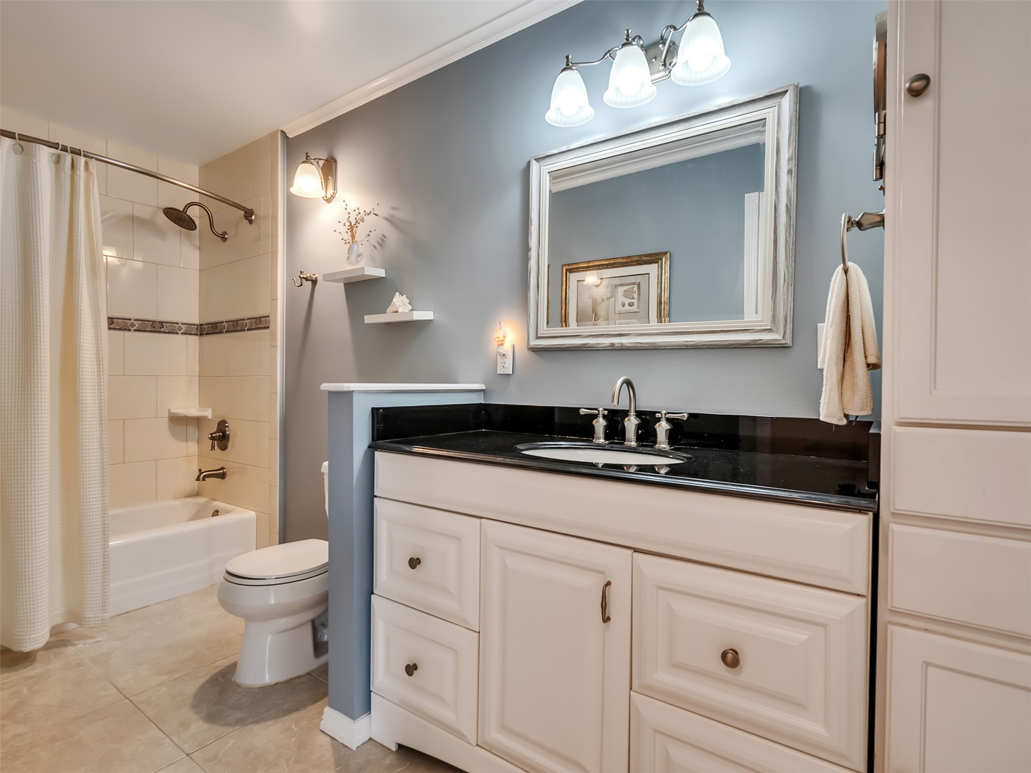 This bathroom is sleek and perfect for getting ready.