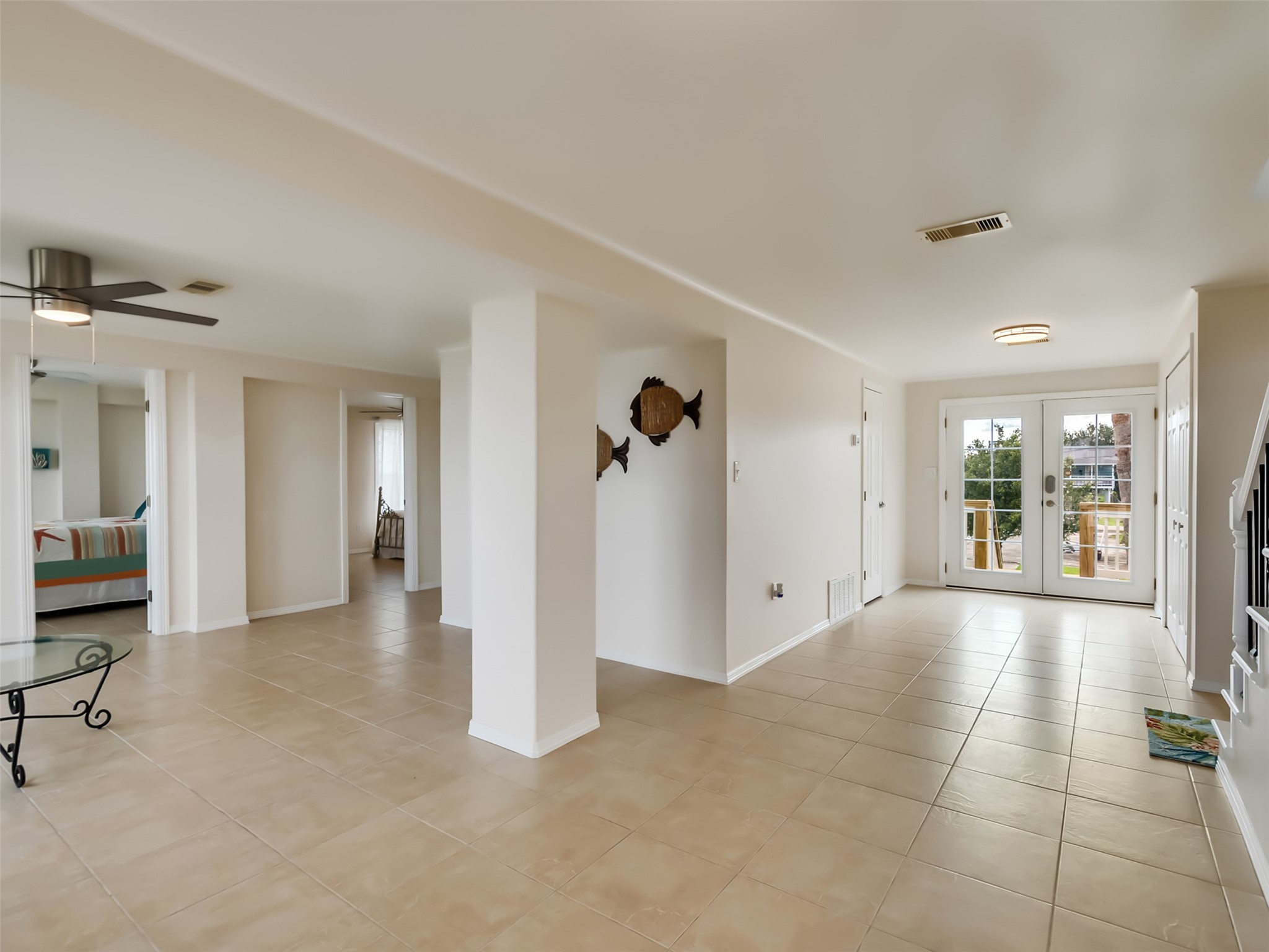 Second floor features two bedrooms and a bathroom.