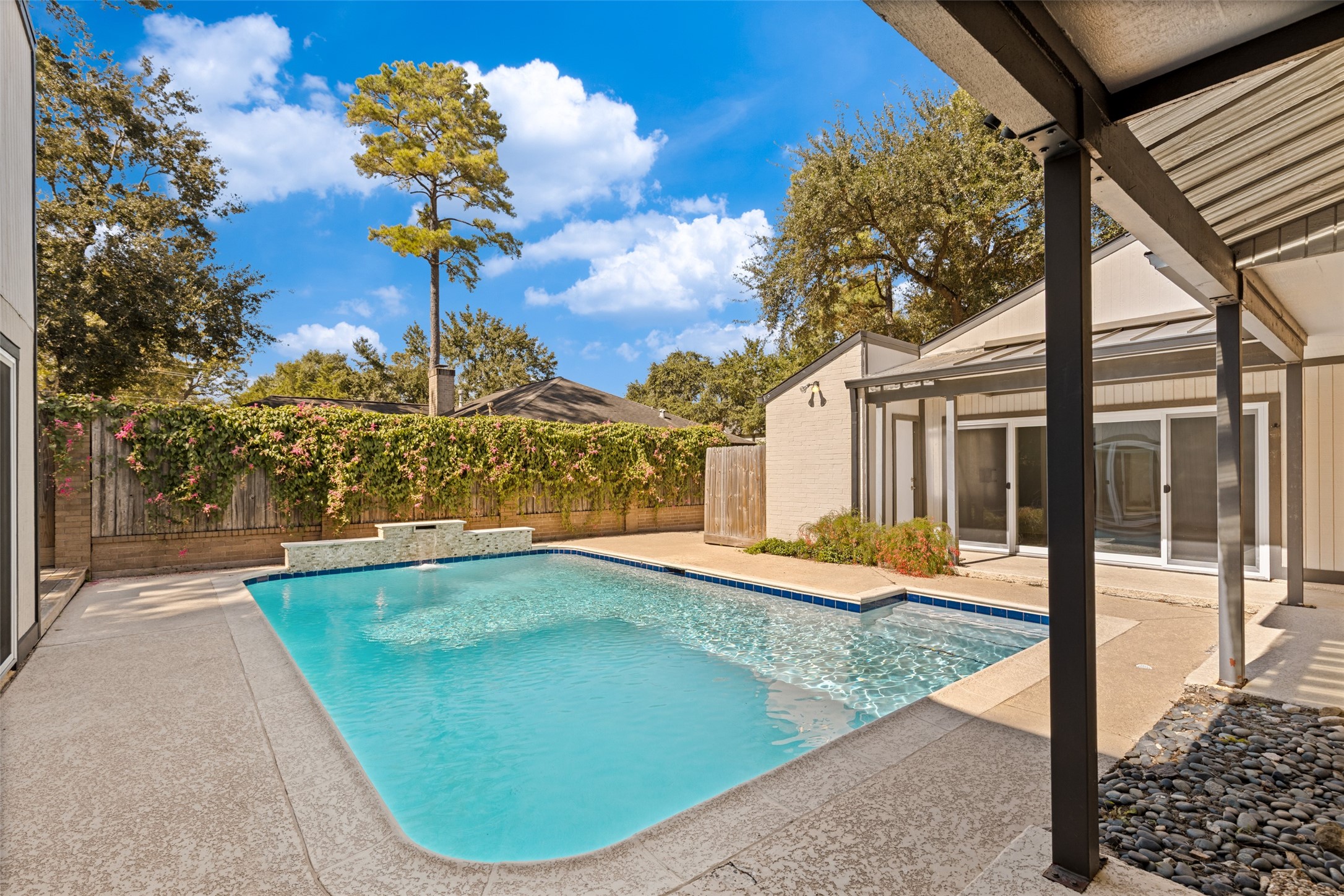 Backyard pool - left side behind house has more space for entertaining