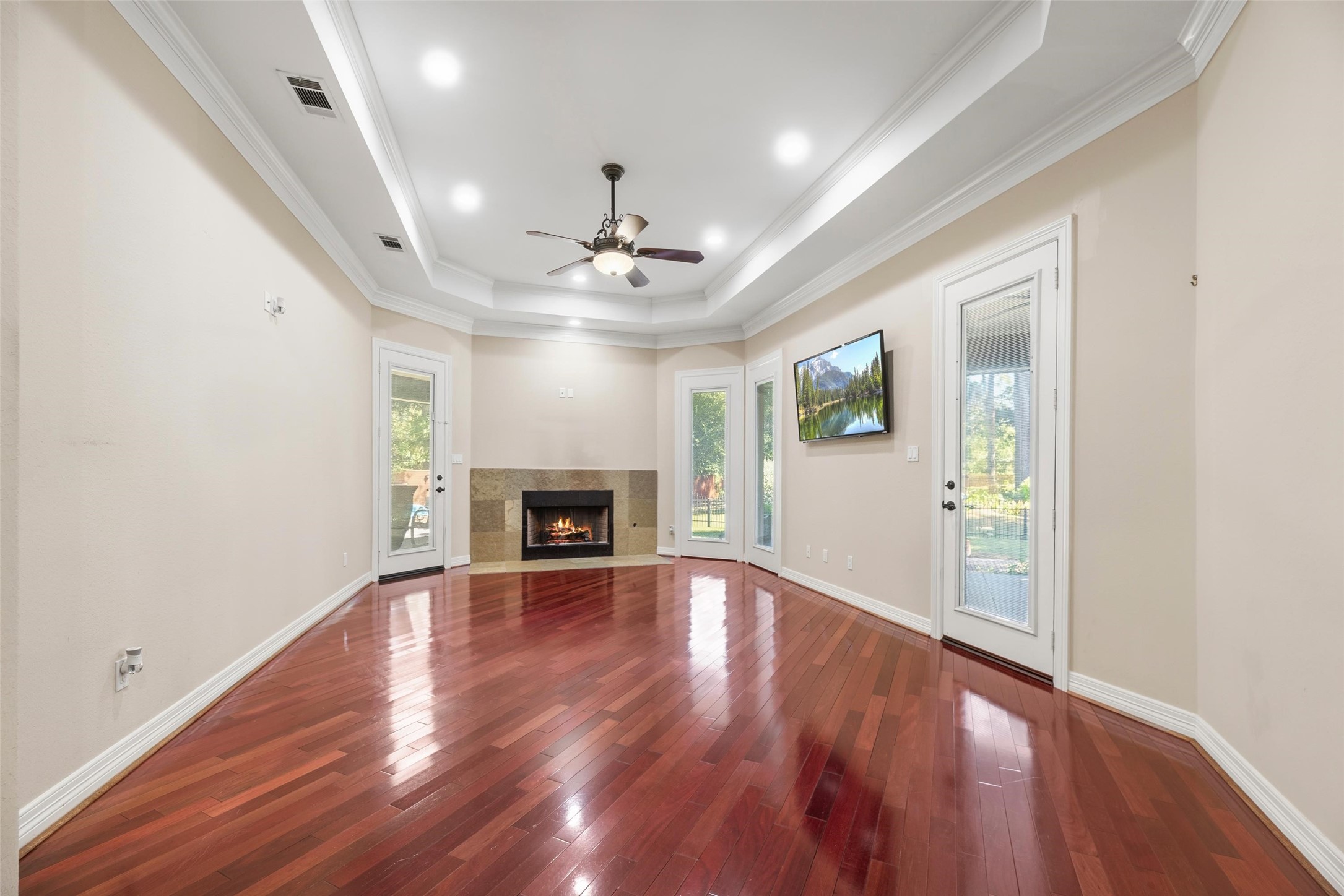 Large primary with 2 large walk in closets, fireplace and plenty of natural light.