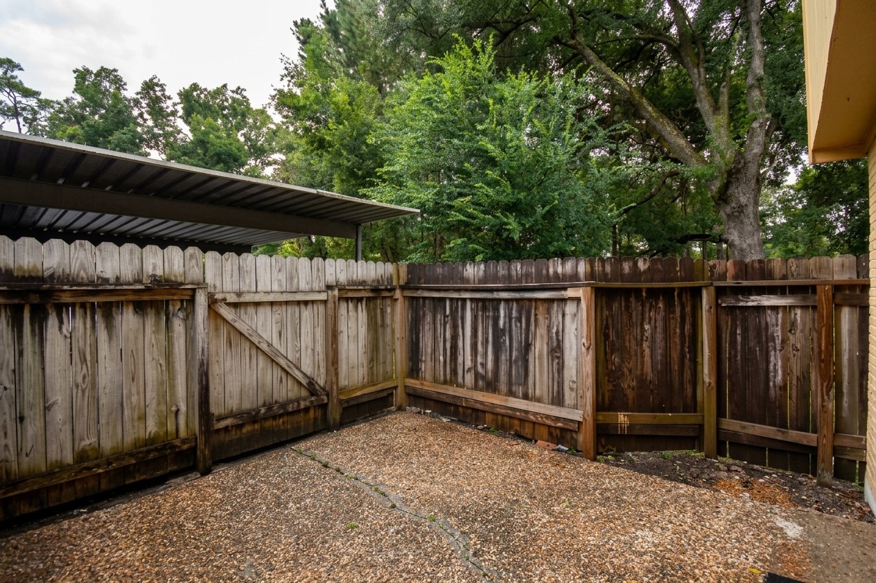 Outdoor living is easy with a private fenced patio that includes a handy storage closet.