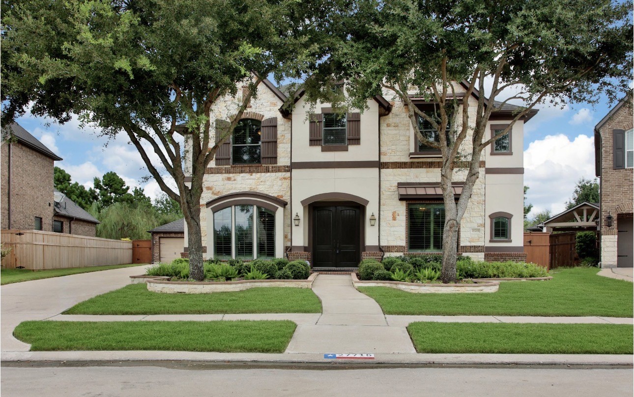 Nestled behind mature trees and beautiful landscaping, this home offers exceptional curb appeal with a sophisticated brick, stone & stucco elevation, offering a warm, welcoming first impression. Nestled behind mature trees and beautiful landscaping, this home offers exceptional curb appeal with a sophisticated brick, stone & stucco elevation, offering a warm, welcoming first impression.