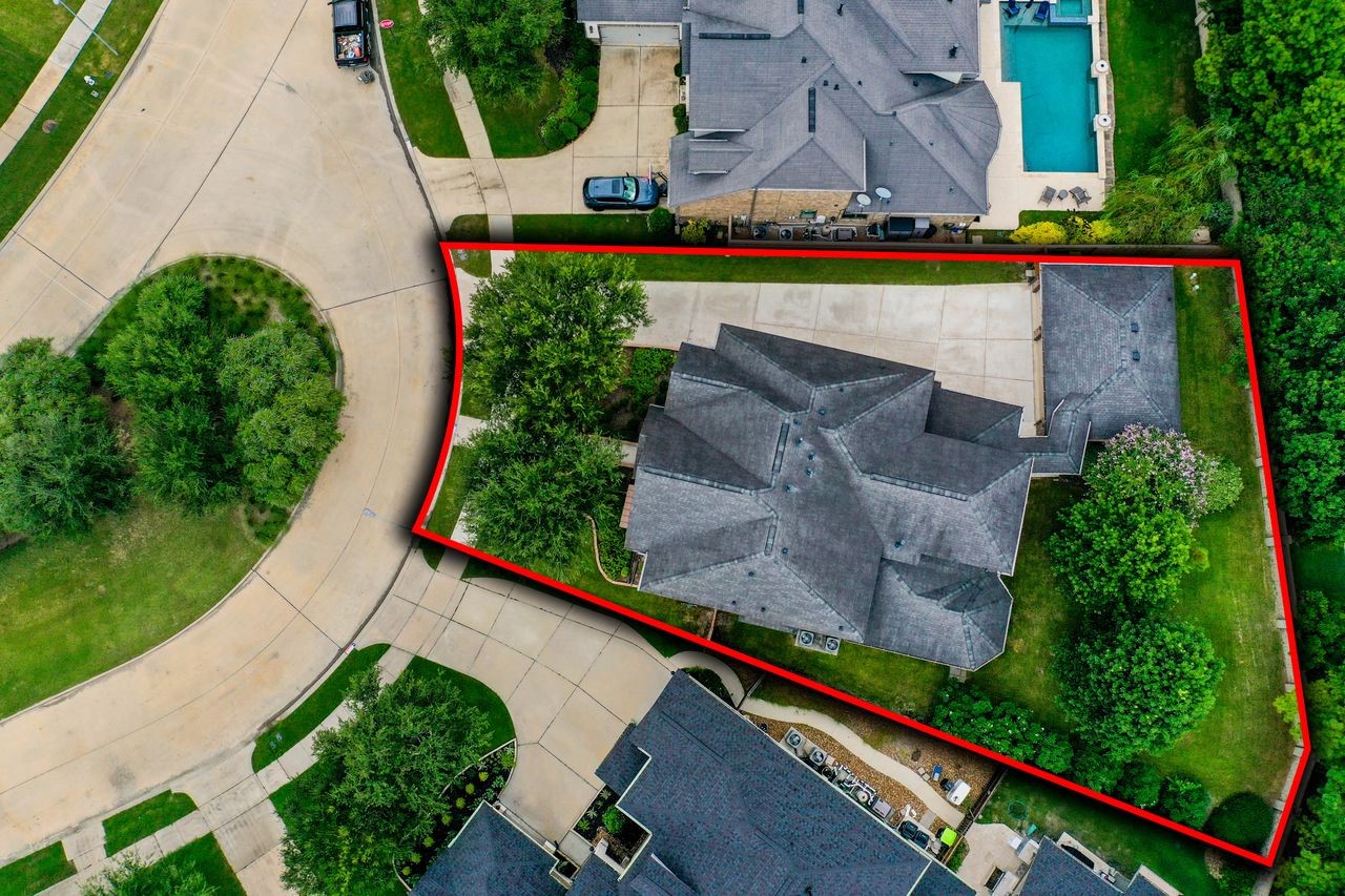 The aerial view truly showcases this premium lot, highlighting the expansive backyard and the privacy of having no back neighbors.
