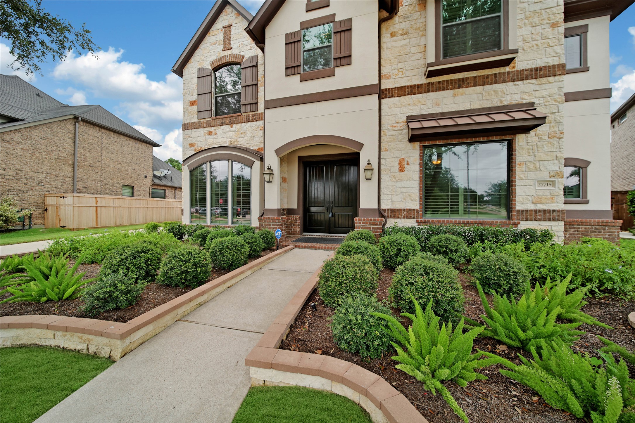 Elegant 8-foot double front doors welcome you inside and hint at the exceptional finishes found throughout the home. Elegant 8-foot double front doors welcome you inside and hint at the exceptional finishes found throughout the home.