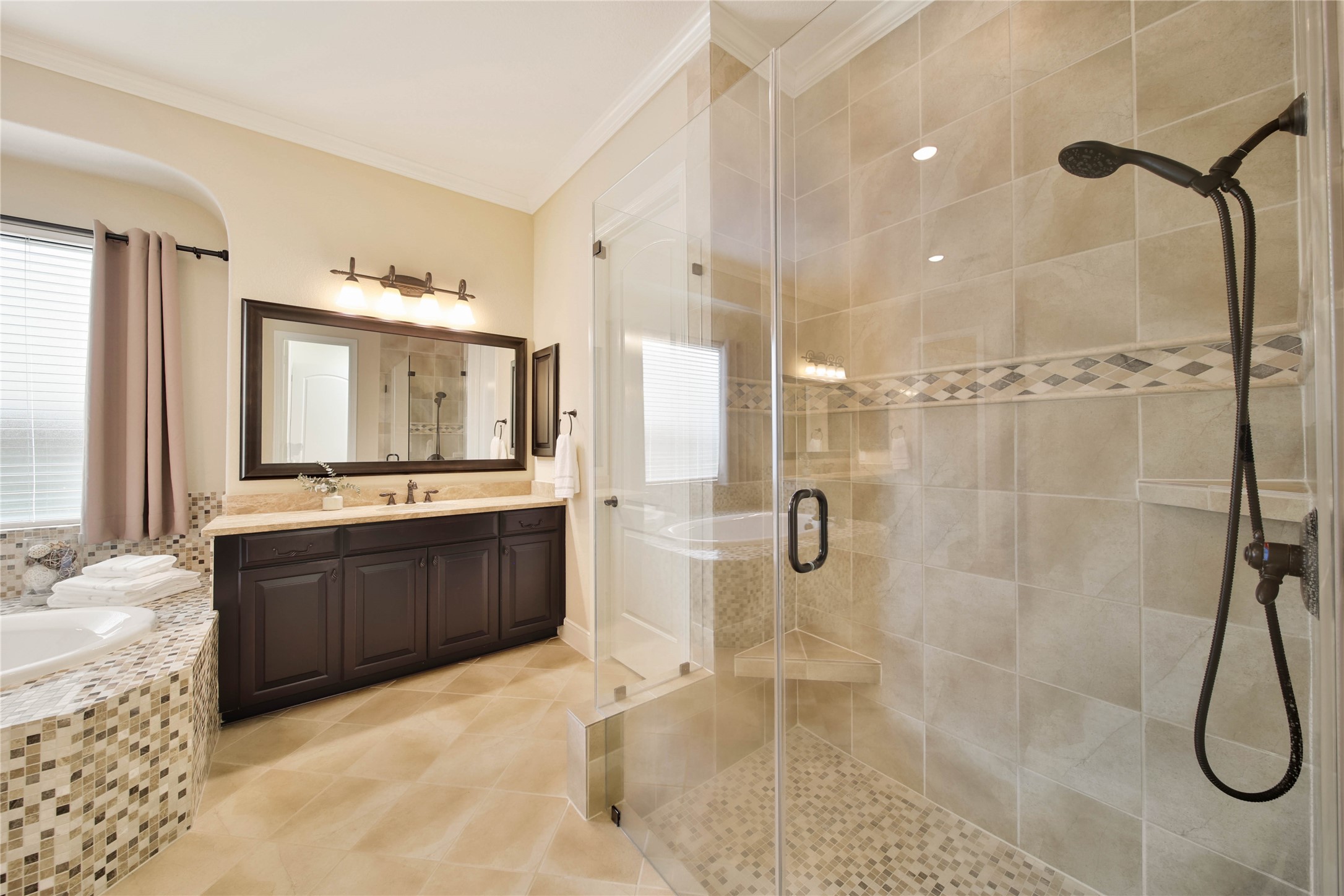 Unwind and relax in the elegant frameless glass shower, where modern style meets everyday luxury.