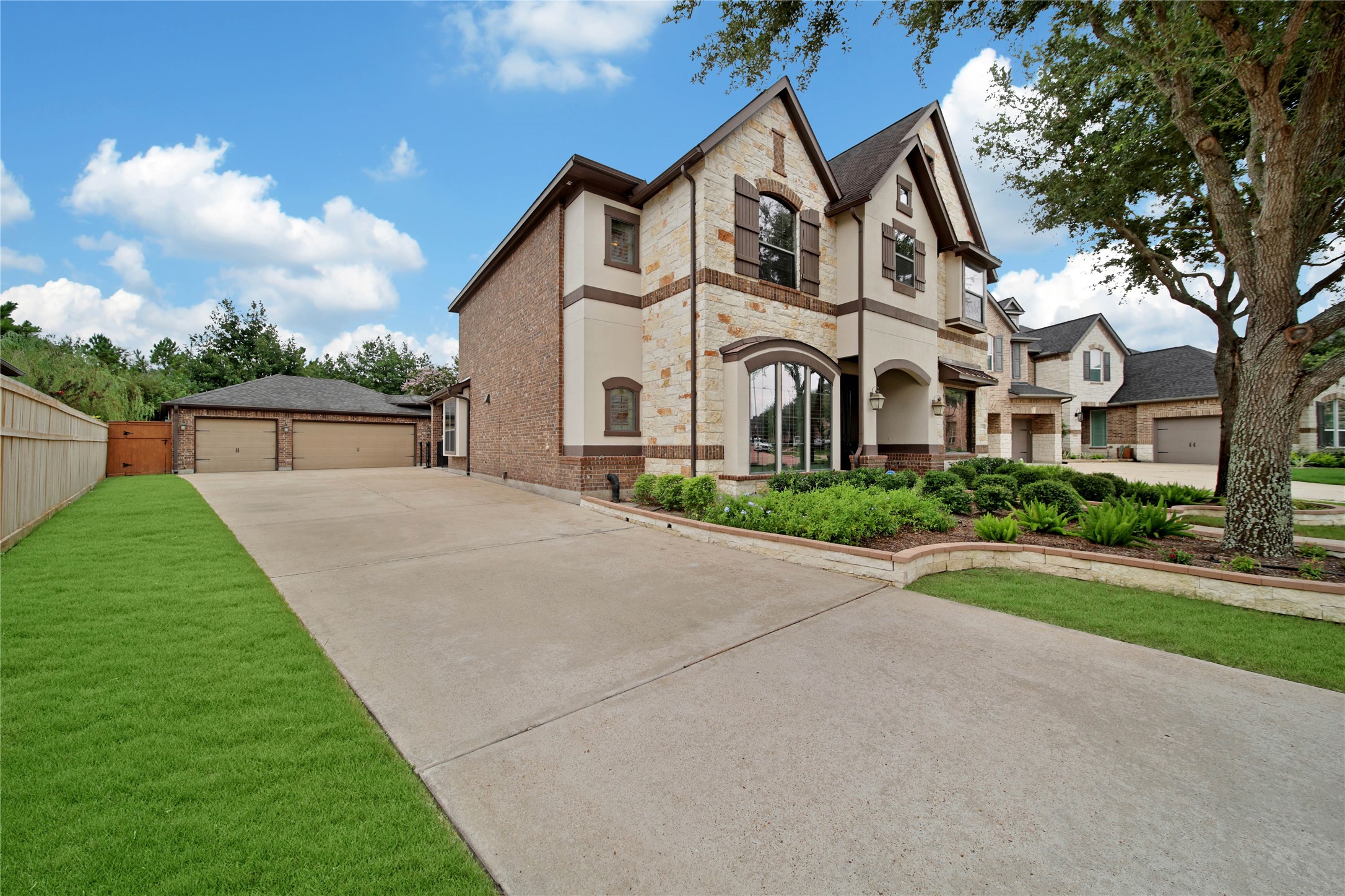 The true detached 3-car garage provides plenty of space for vehicles, storage, and all your weekend projects. A long driveway offers additional parking for family and guests. The true detached 3-car garage provides plenty of space for vehicles, storage, and all your weekend projects. A long driveway offers additional parking for family and guests.
