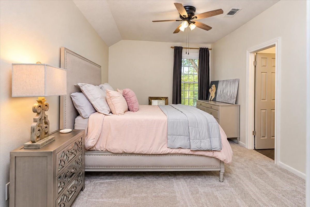 Another view of the comfortable secondary bedroom.