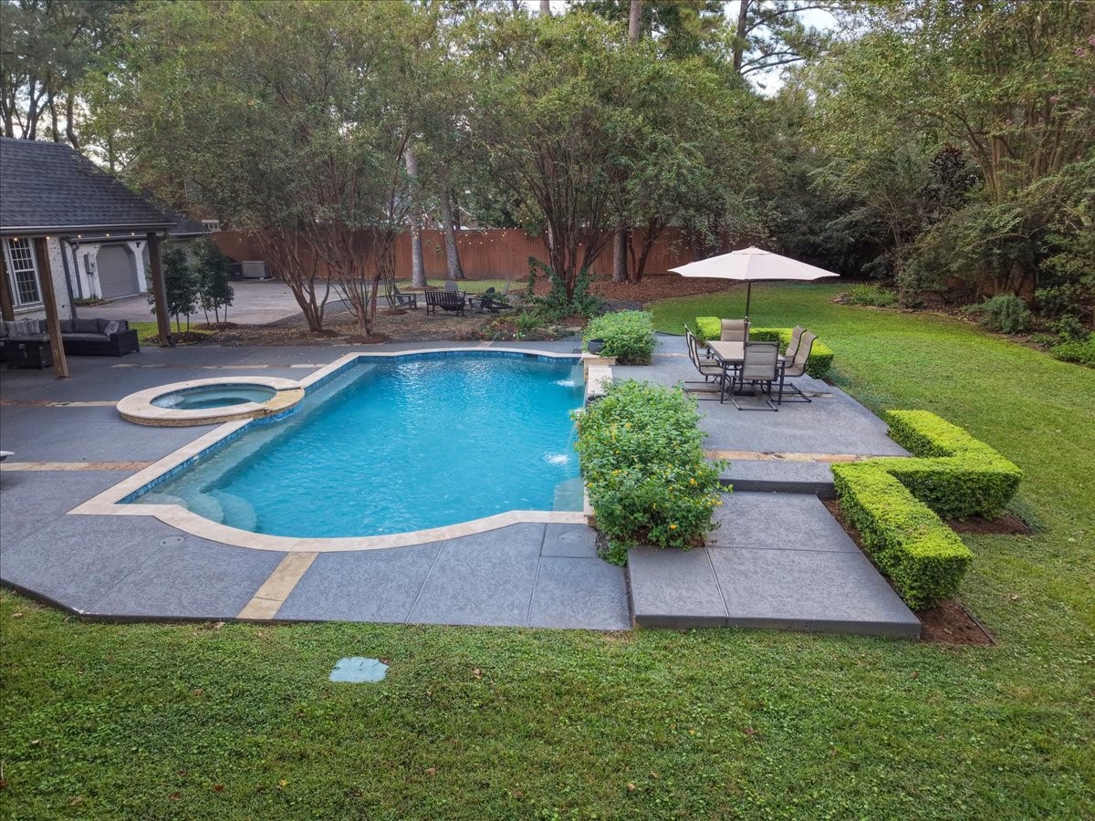 Beautiful grounds, built to last. A Rainbird irrigation system installed in 2022 waters the front and back yards, giving this fenced backyard its fresh, manicured look, with room to play, lounge, and entertain.