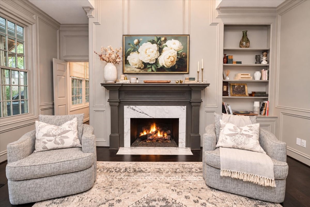 Cozy evenings start here. Light the upgraded gas logs with a turn of the knob and a lighter, then settle in beside an elegant marble-surround fireplace for quiet nights in or holiday gatherings.