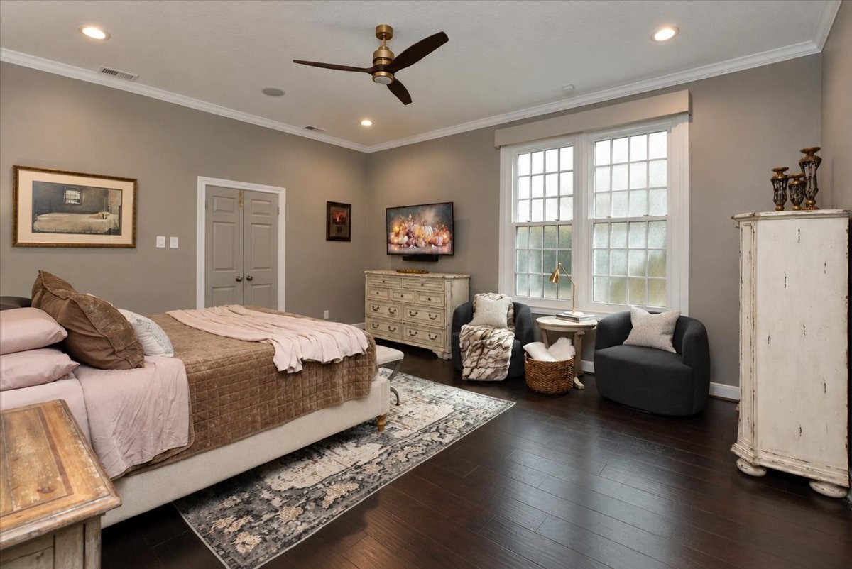 Light, bright, and peaceful. Automatic custom shades with remote, with blackout in the primary, let you set the mood from bed, while new triple-pane windows keep the room comfortable and quiet.
