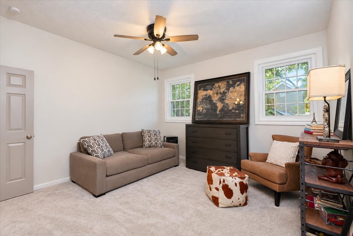 Bright, flexible, and easy to enjoy. Tucked away on the second floor, this bedroom has a walk-in closet and leafy window views.