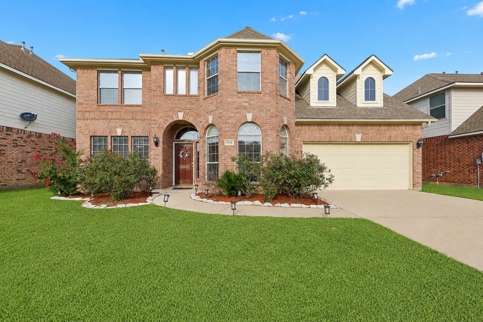 This two-story brick home features a classic design with a welcoming front entrance and well-maintained landscaping. It offers a two-car garage and a spacious front yard, ideal for families. This two-story brick home features a classic design with a welcoming front entrance and well-maintained landscaping. It offers a two-car garage and a spacious front yard, ideal for families.