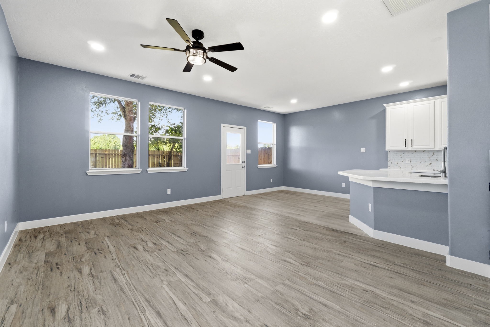 Open floor plan features lots of windows for natural light Open floor plan features lots of windows for natural light