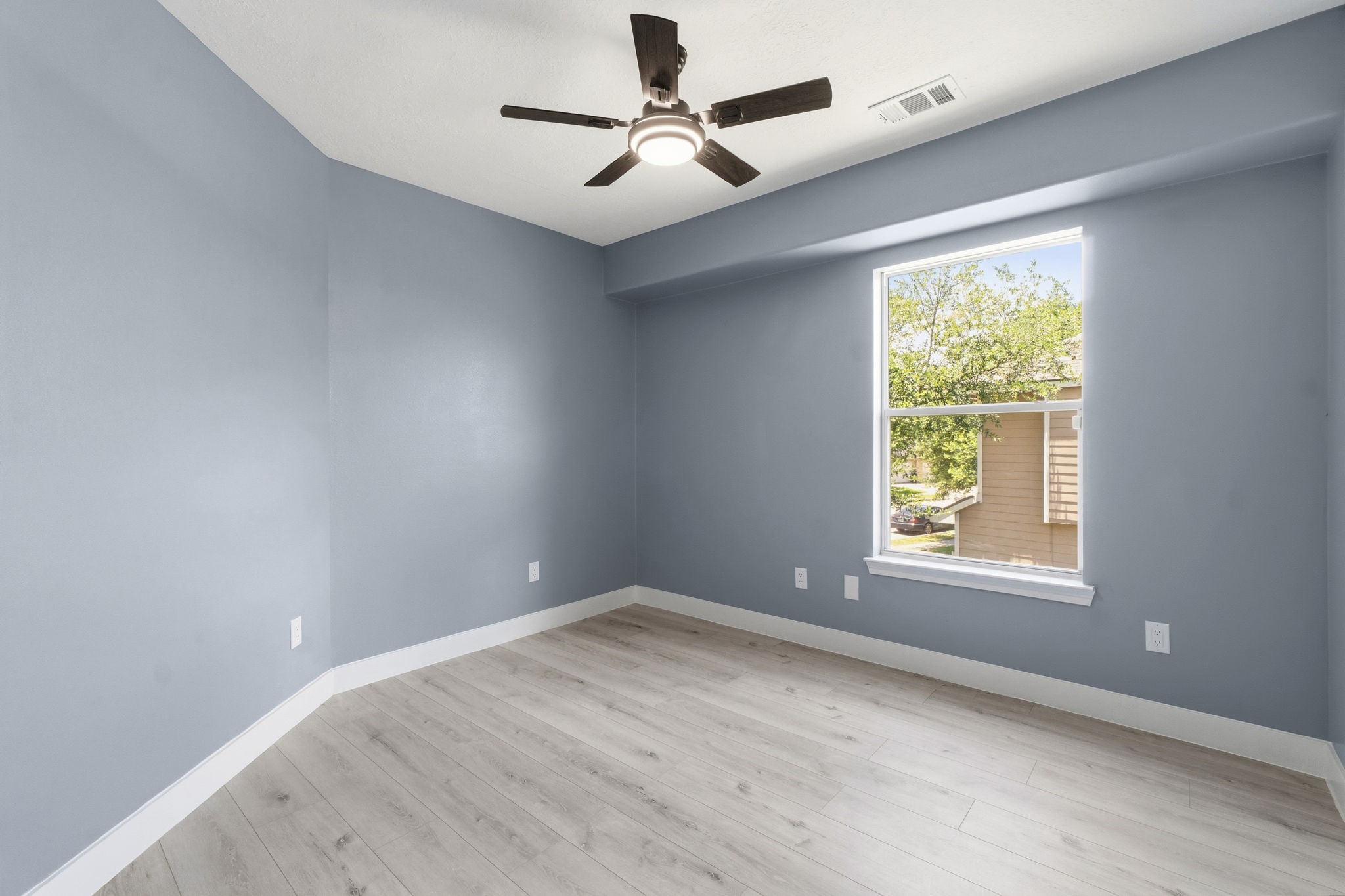 All bedrooms have laminate wood floors and upgraded baseboards