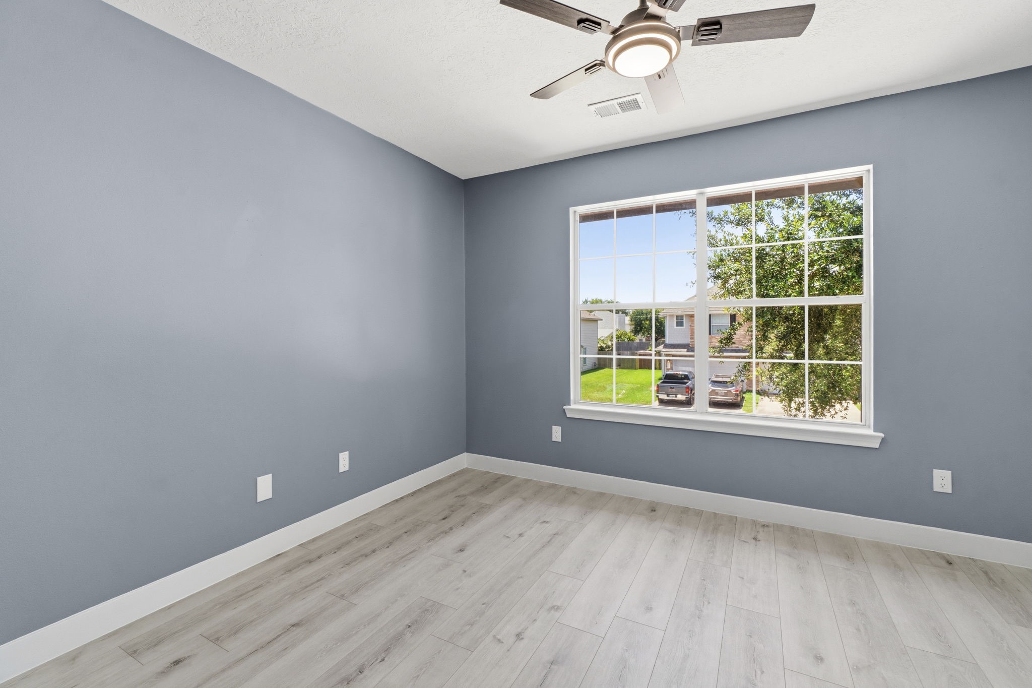 Secondary bedrooms feature large window and Fans