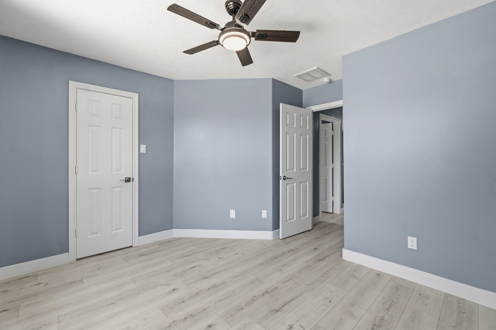 Fresh interior paint enhances every room with a bright, clean look.