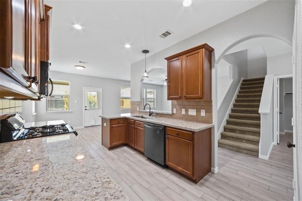 Kitchen area with beautiful granite counters!