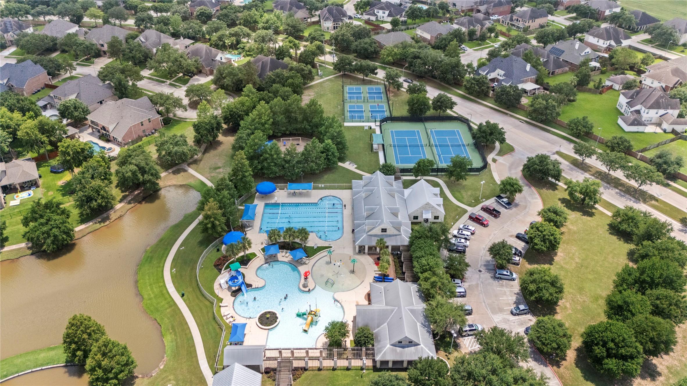 Residents love the mature trees, miles of walking trails, resort-style amenities, parks, pools, fitness center, and strong sense of community.