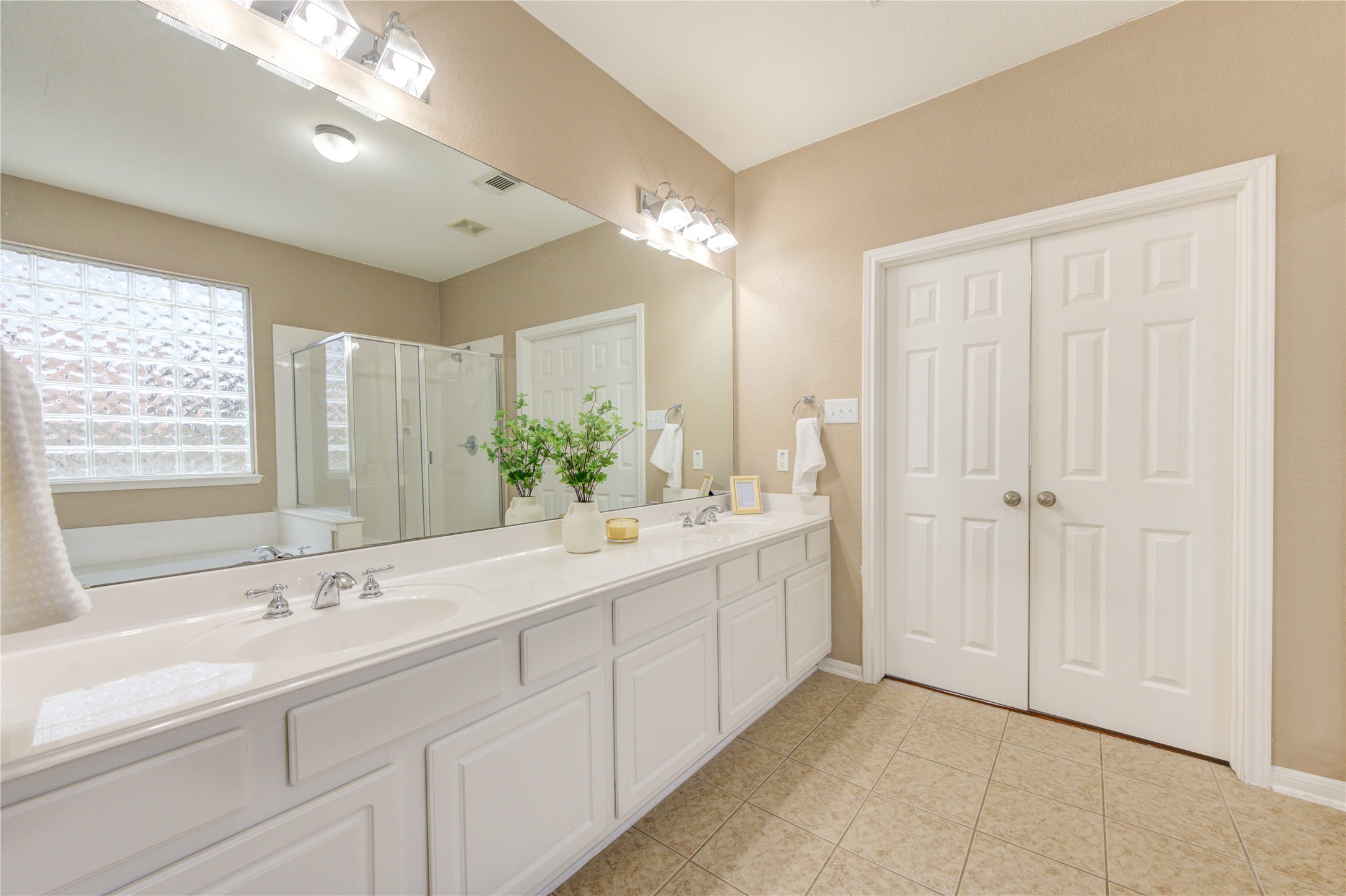 Extended counter space with ample storage, and a large mirror