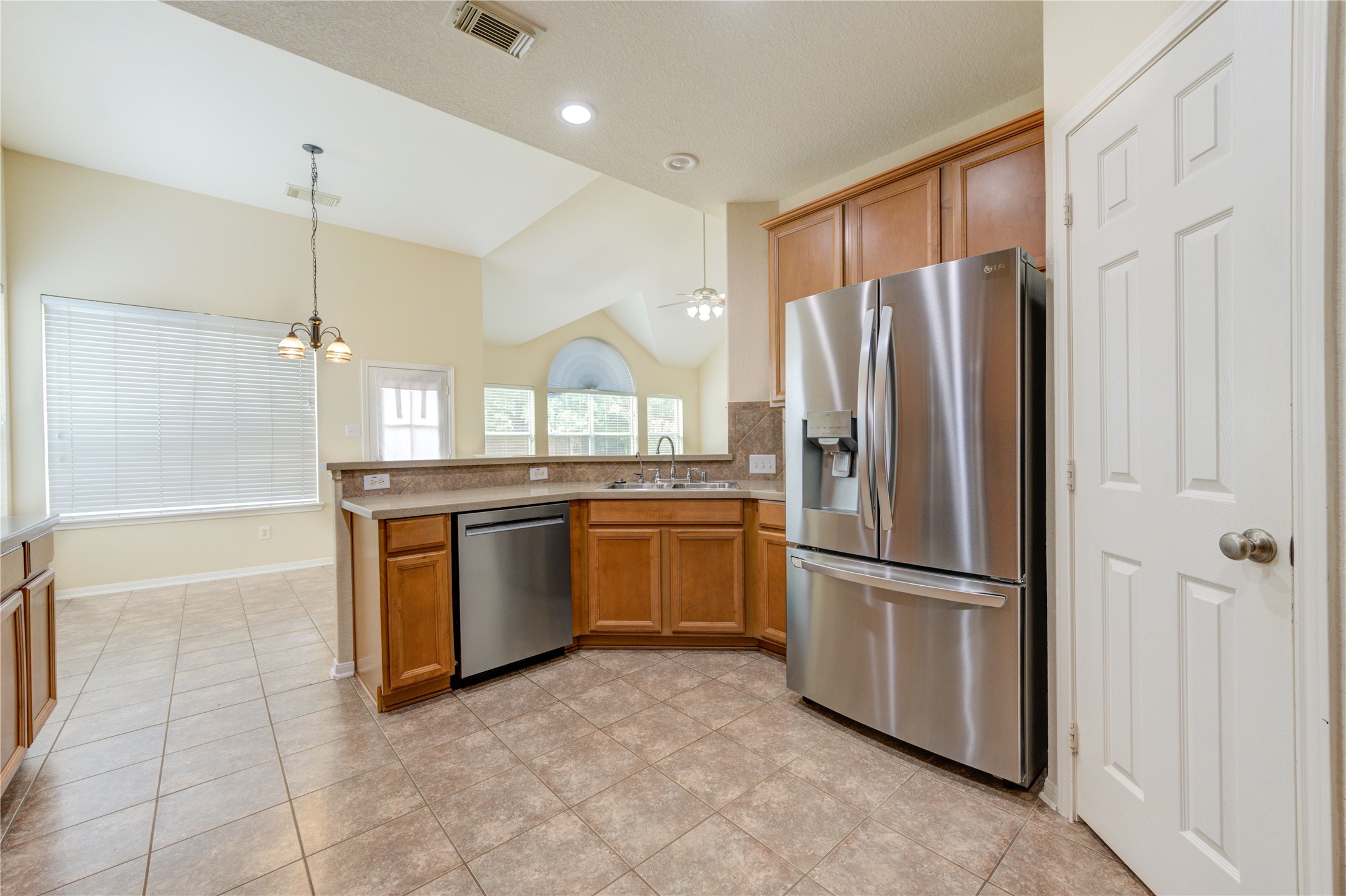 Breakfast bar seating, and beautiful sightlines into the main living space.