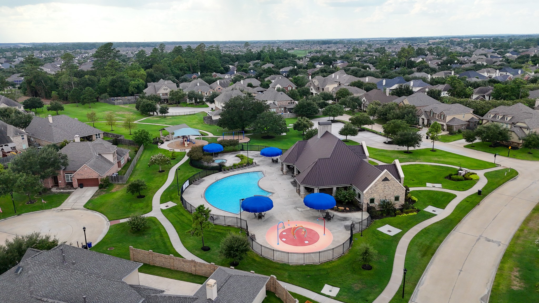 This community features a swimming pool, a splash pad, a kiddie pool, a park, a picnic area, walking trails, and ponds for residents to enjoy.
