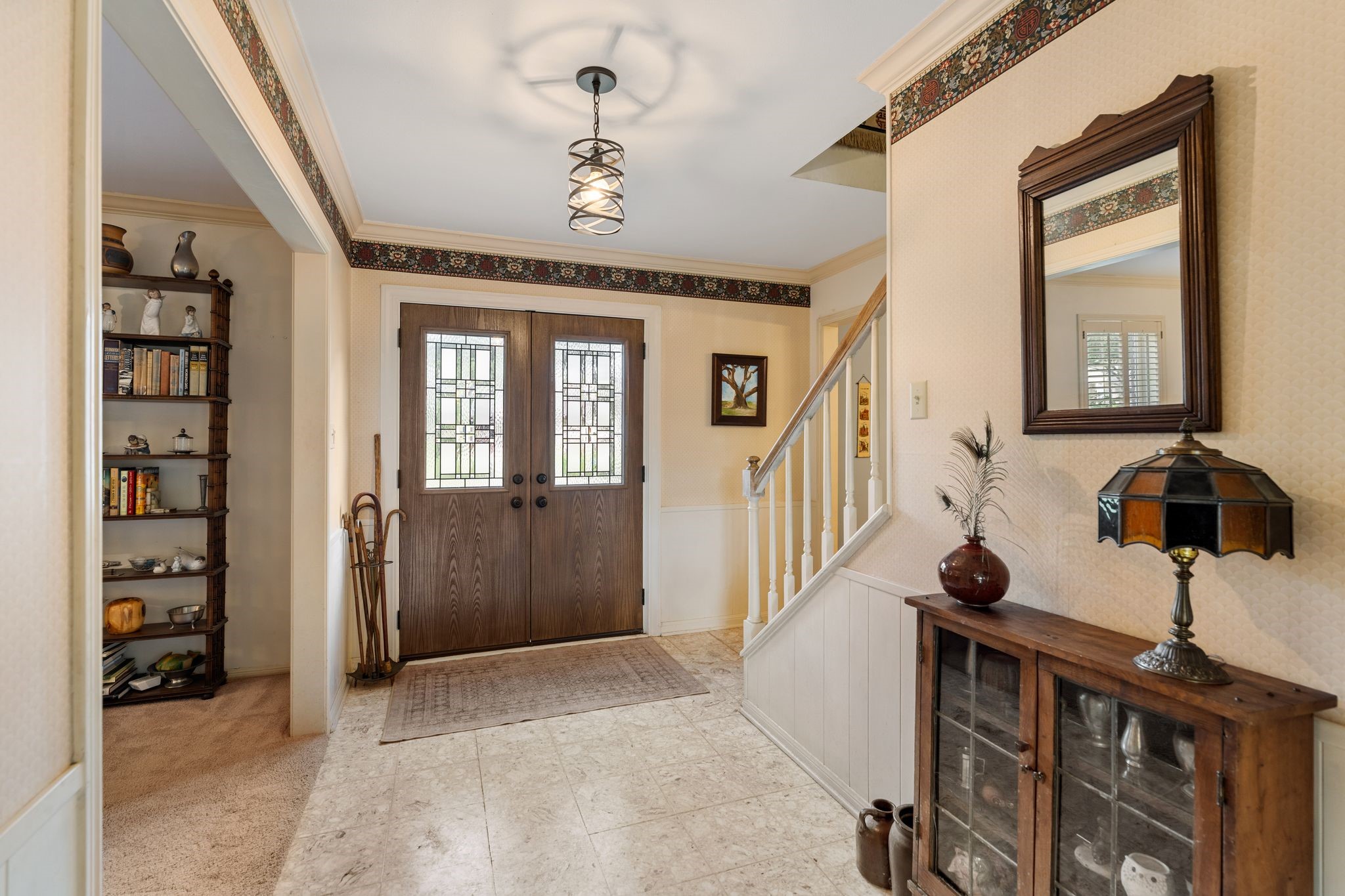 A spacious foyer at the entrance that opens into all the downstairs living spaces. A spacious foyer at the entrance that opens into all the downstairs living spaces.
