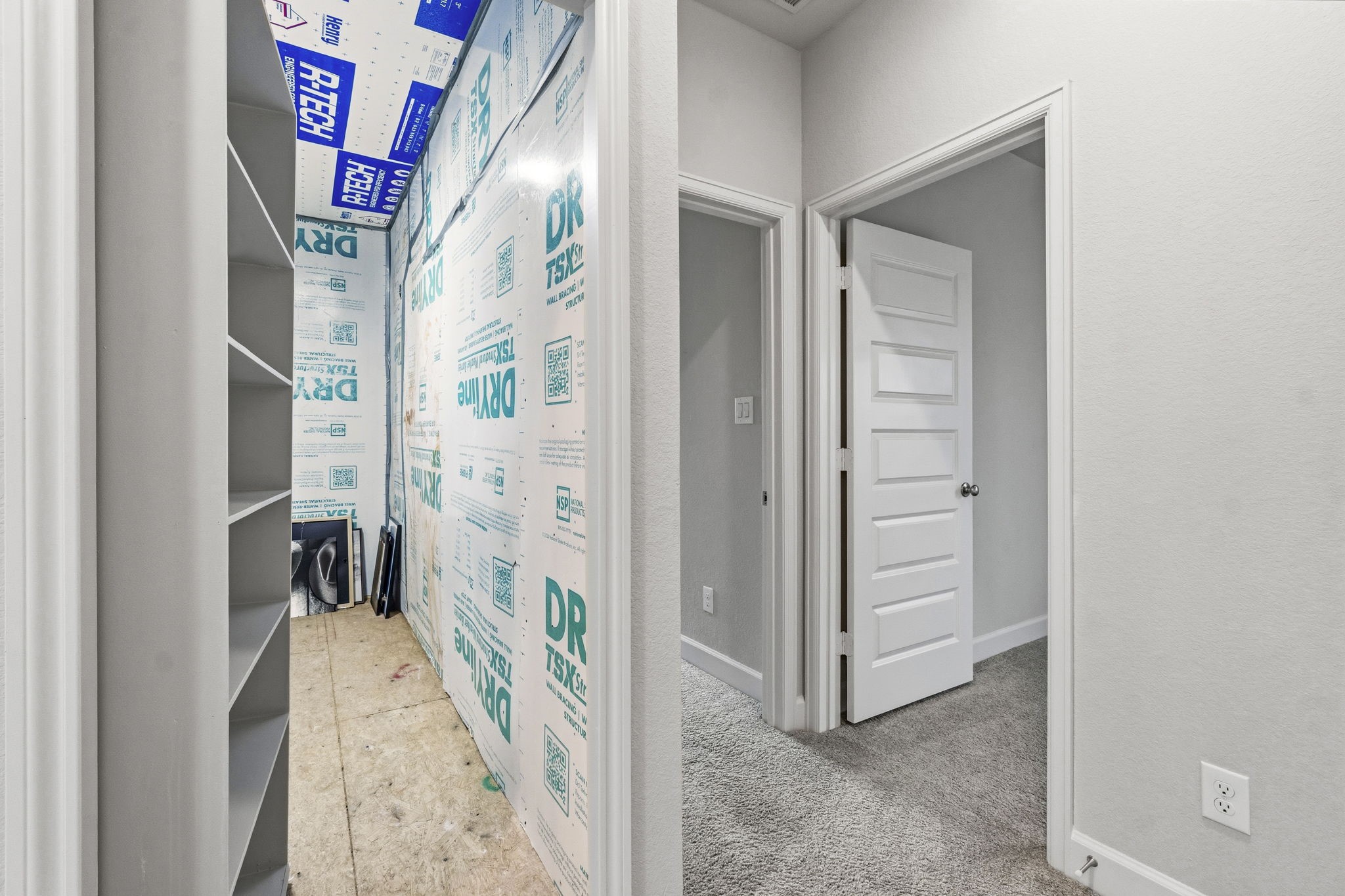 A hidden storage room measuring approximately 13' x 5' provides valuable extra space for seasonal dcor, luggage, or additional household storage.