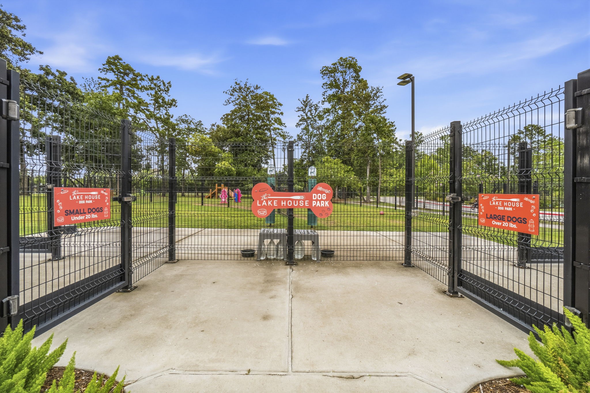 Two fenced dog parks with separate areas for large and small dogs.