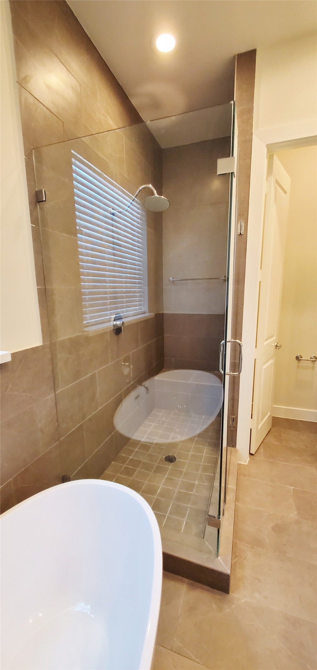 Primary bathroom with separate walk-in shower