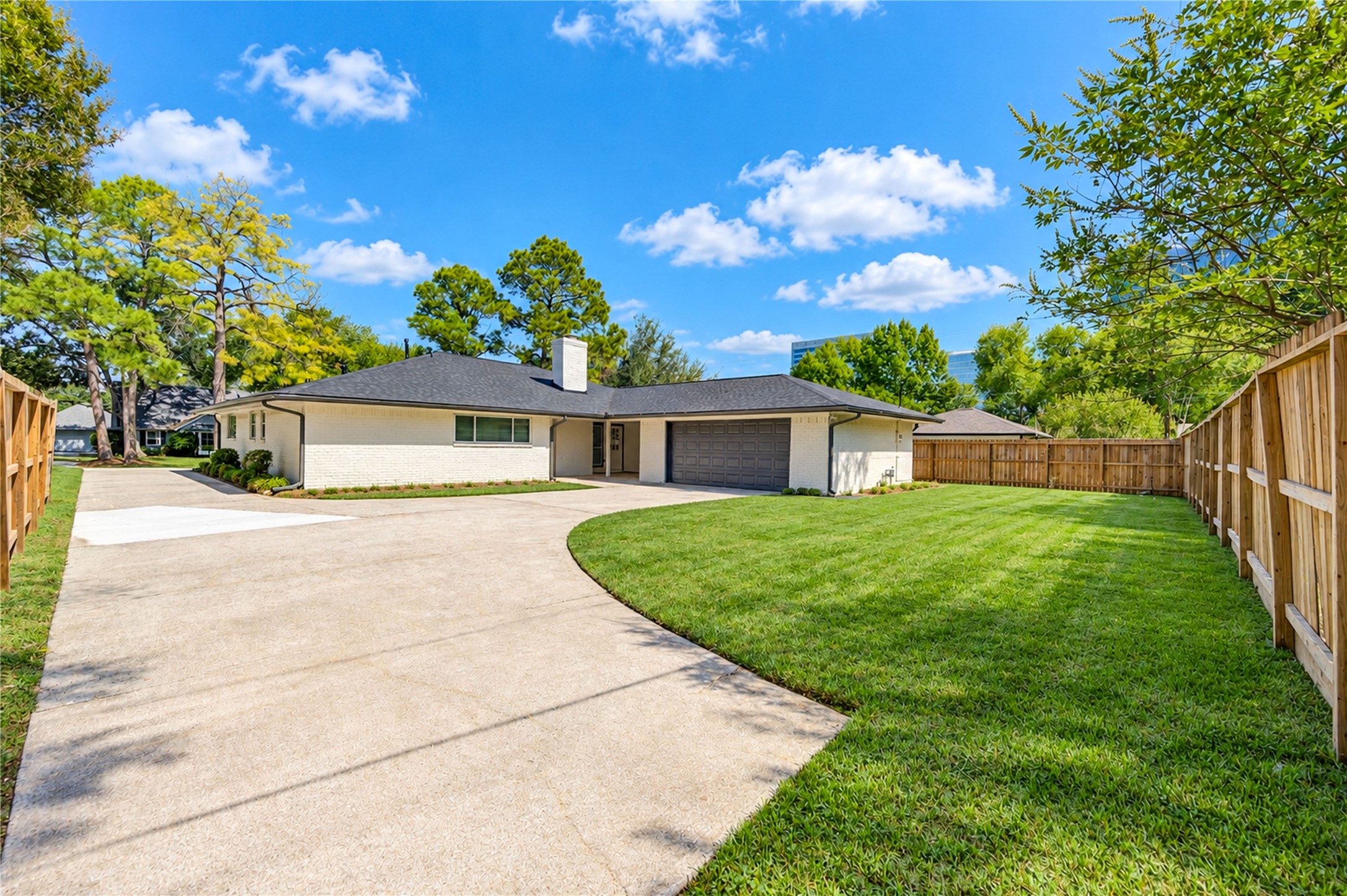 Impressive extended concrete driveway provides abundant additional parking and convenient access to the detached garage. A sidewalk also provides access around the home!