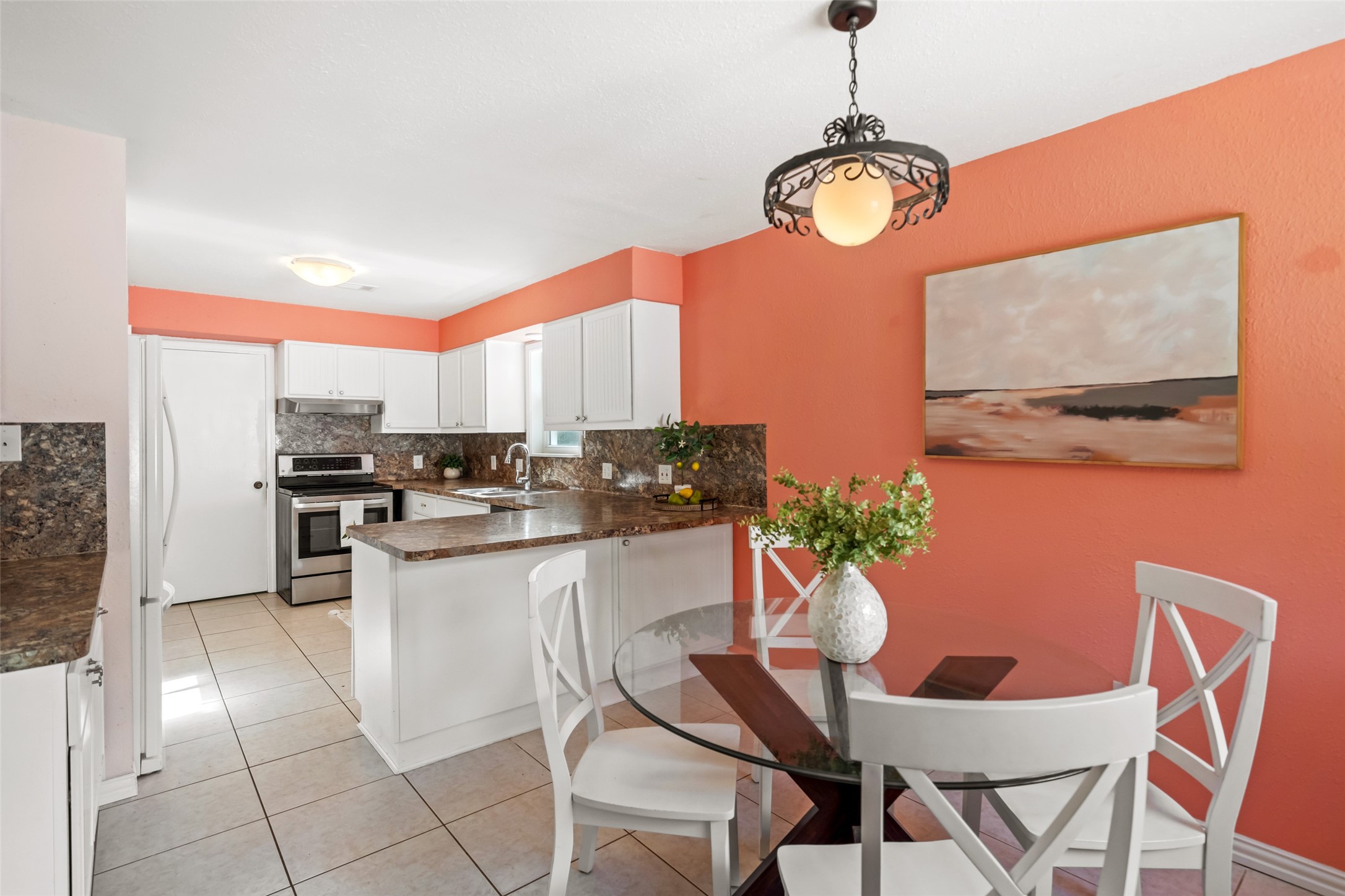 UPDATED kitchen with 31" deep countertops. Allows for plenty of workspace and lots of EXTRA DEEP cabinets for additional storage!  Also includes a counter height bar for additional sitting at the kitchen counter near the cook!