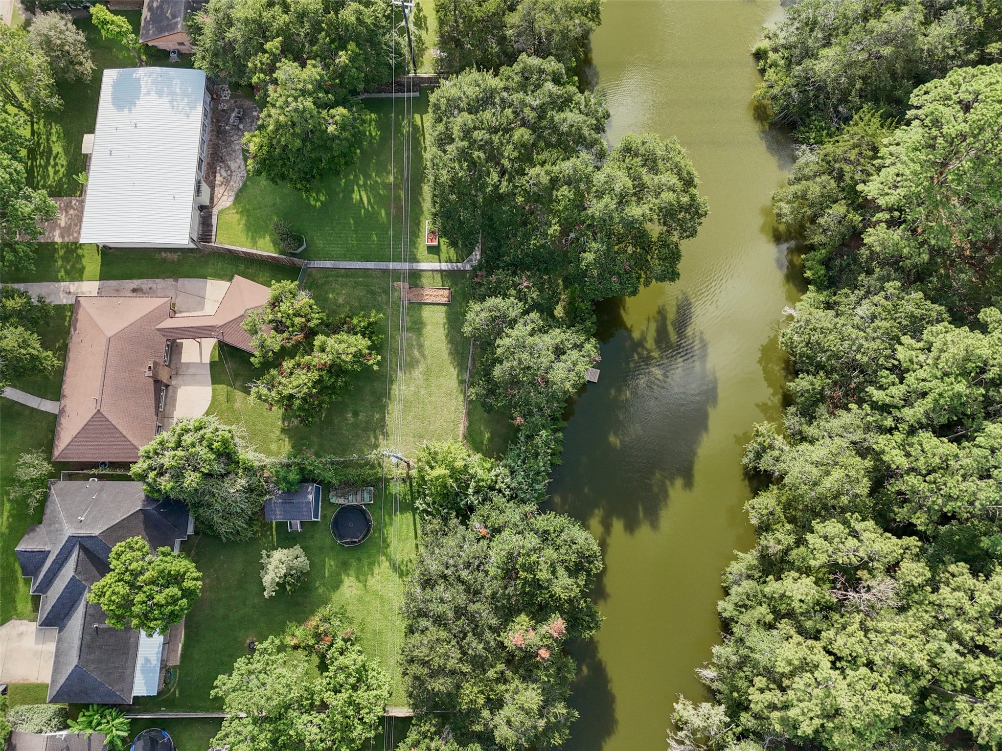 This is home is a rare opportunity to live in a quiet neighborhood with private water access! Wish I could bring the sound of this waterfront living to you, instead, you'll have to make an appointment to experience it for yourself! You won't want to to it before it's gone, call to see it TODAY!!