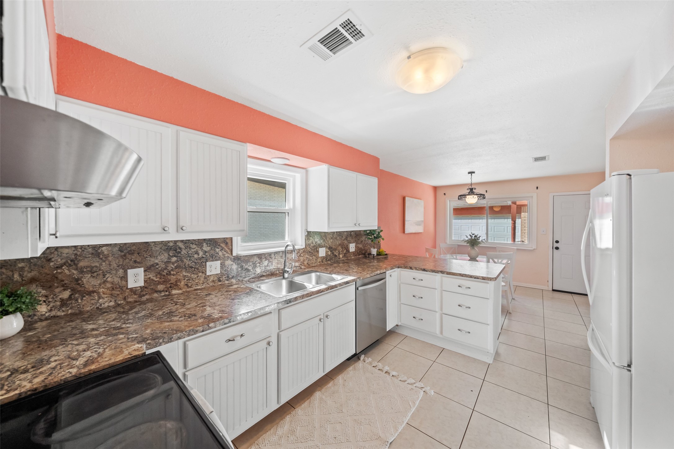 Love the window over the sink and all of the drawer space!