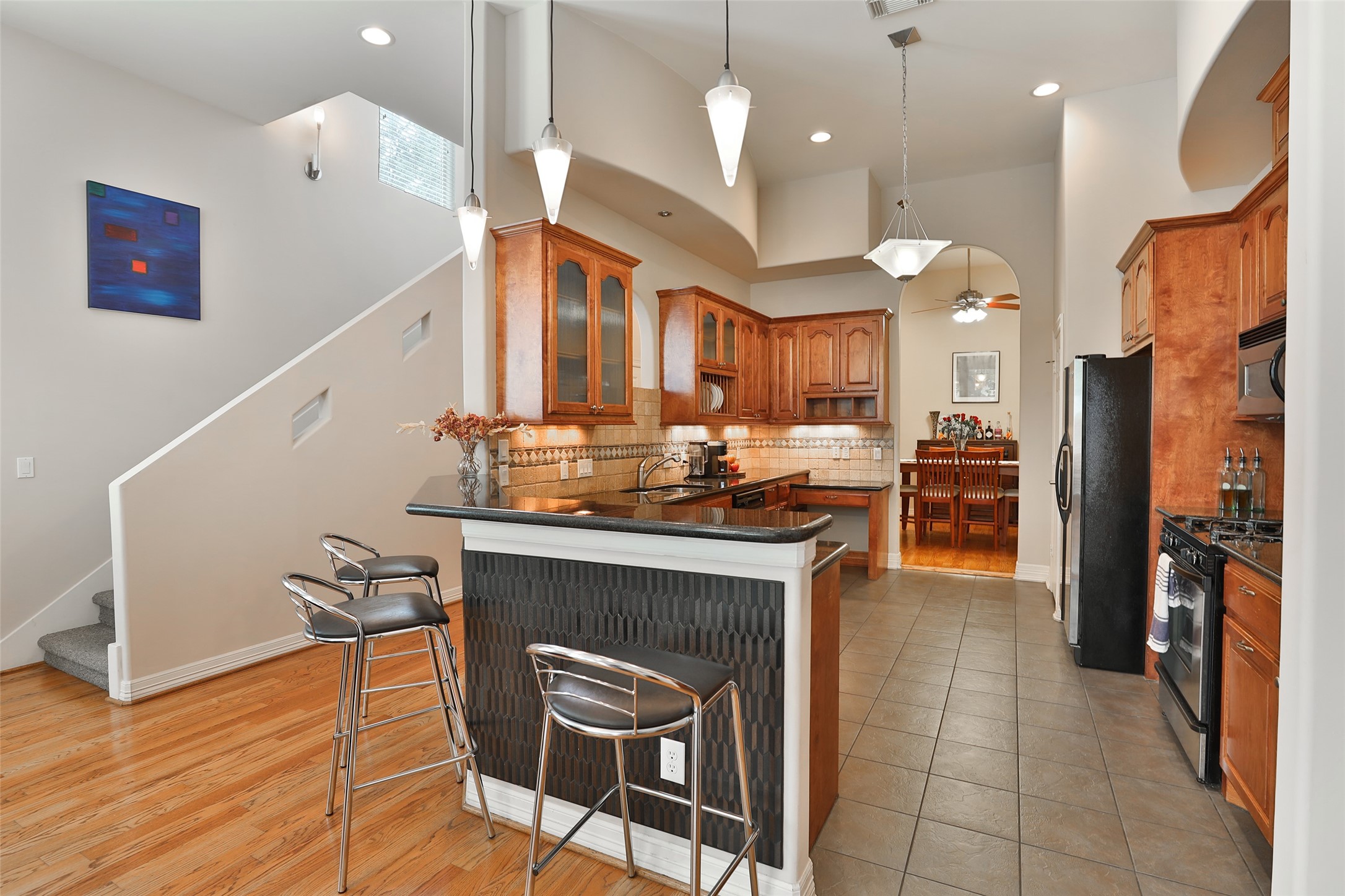 The kitchen is open to the den. The kitchen is open to the den.