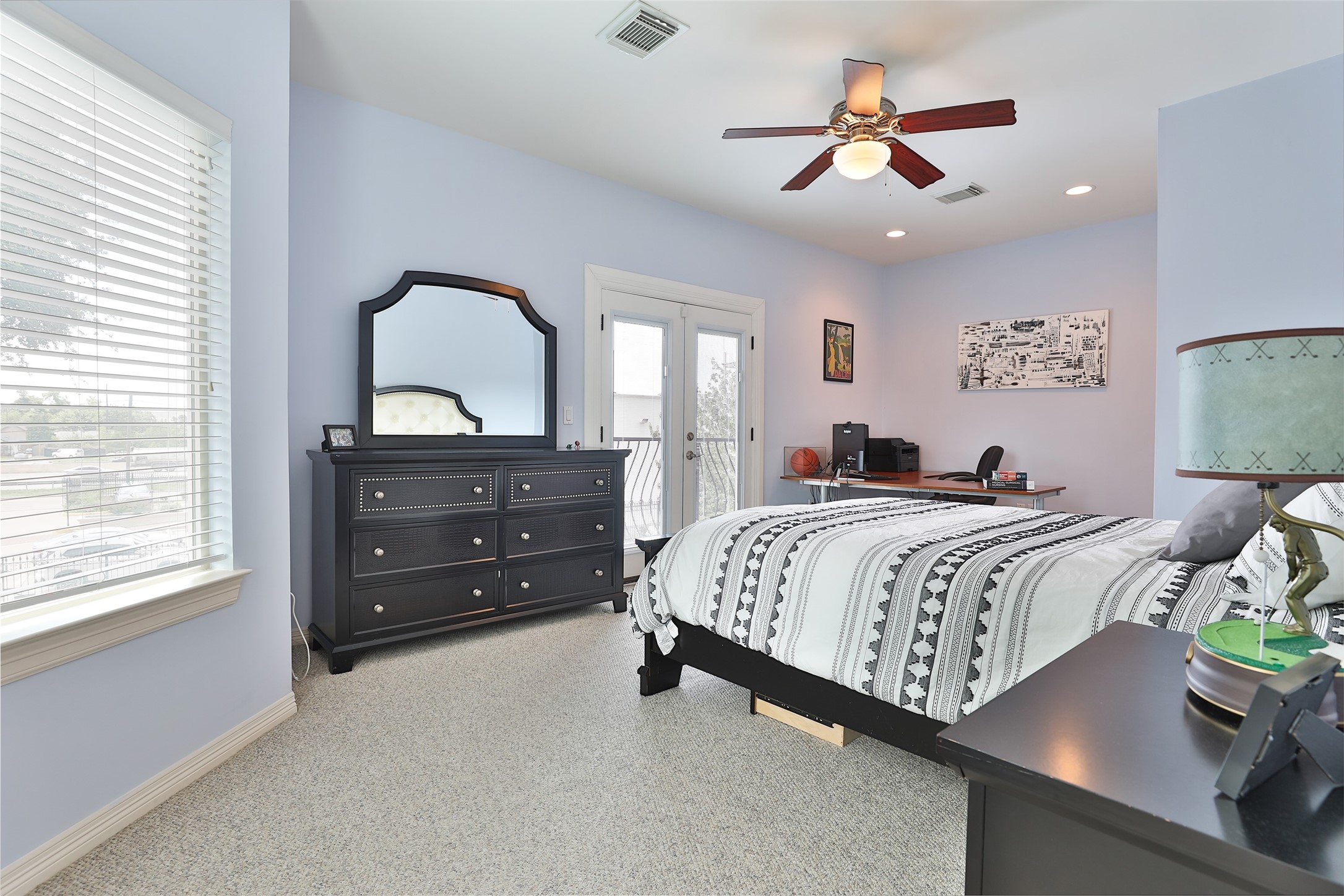 Large second bedroom with extra space for desk or sitting area.