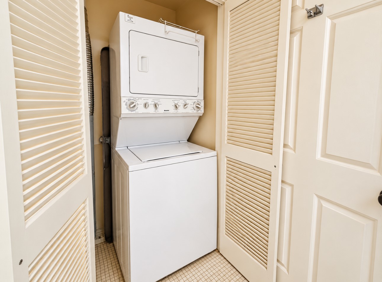Stackable washer/ dryer with storagein bathroom