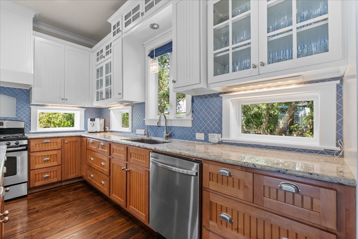 Glass-front cabinetry beautifully showcases your favorite glassware.
