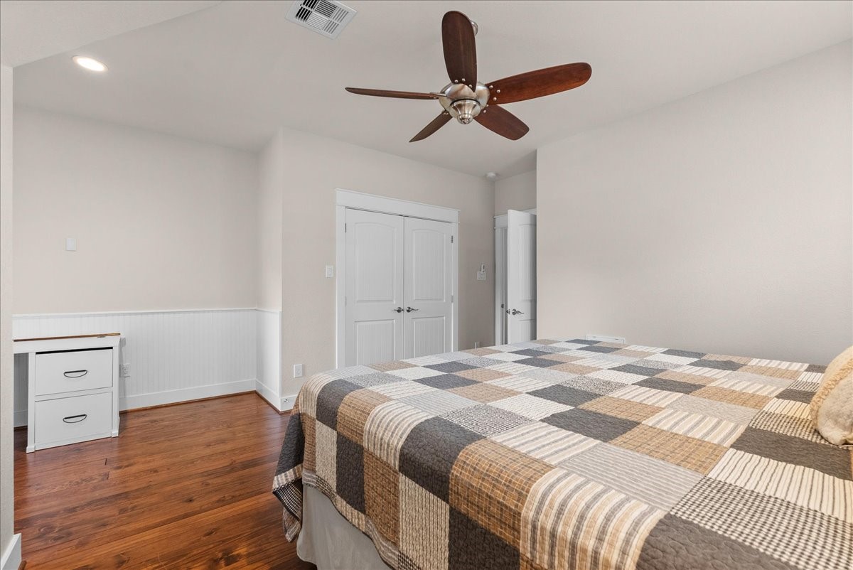 Secondary bedroom features ample closet space and easy access to the shared hall bath.