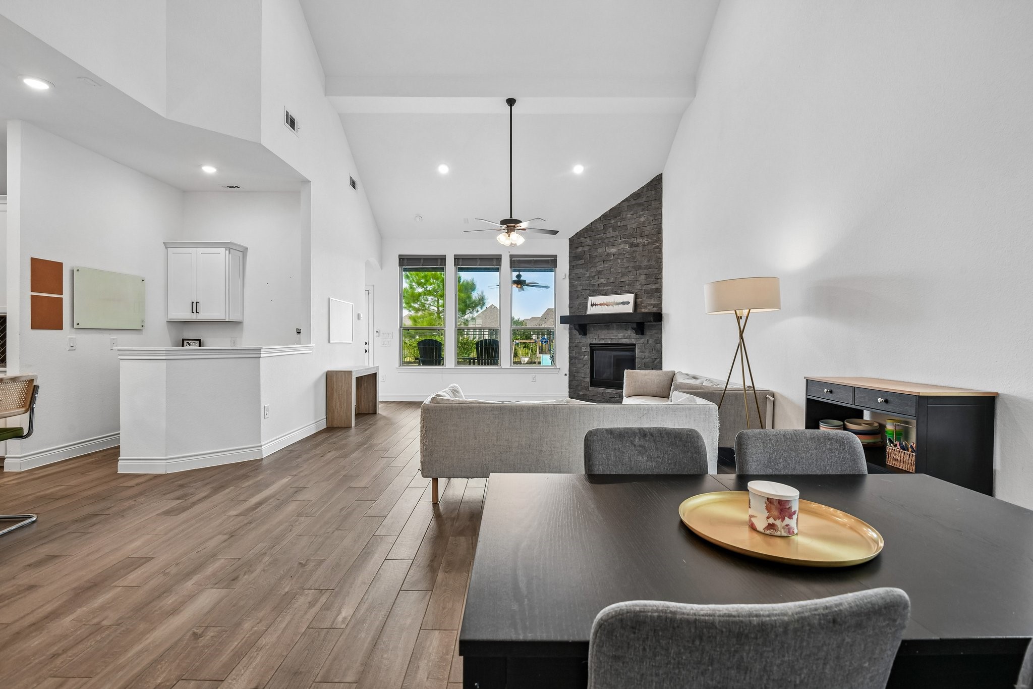 Dining area positioned beside the kitchen with natural light and room for a substantial table